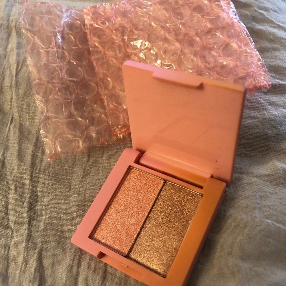 Farah duo eyeshadow, clear brow gel and Shades by Shan Erika lip gloss.